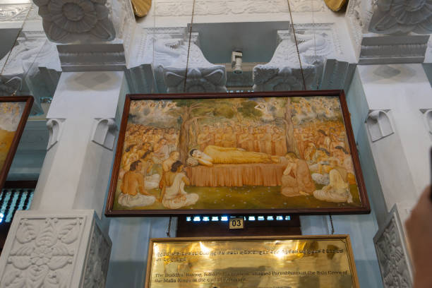 Kandy, Sri Lanka - January 24, 2024: Explore the serene beauty within Sri Dalada Maligawa, as numerous Buddha statues adorn the sacred interior, reflecting tranquility and reverence.
