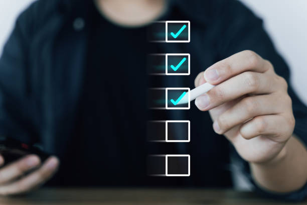 istock Online survey filling out and digital form checklist quality check improvement. Standardization, certification. Compliance to regulations service and standards, customer feedback online, Testimonial 2070493962