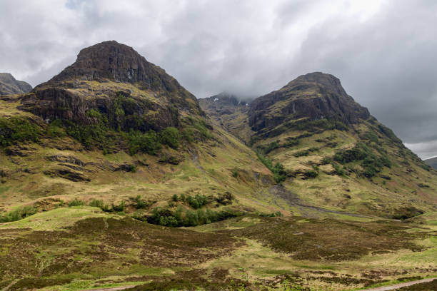 istock Clouds caress the peaks of the Three Sisters in Glen Coe, creating a dramatic and imposing highland landscape. Scotland 2070504935