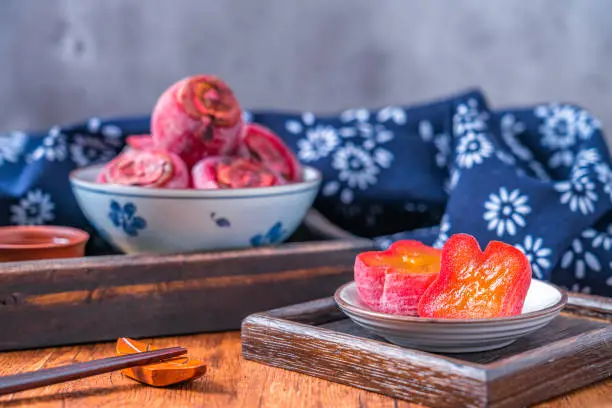 Traditional Chinese food persimmon cakes on marble tabletops
