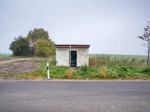 This picture shows the Landscape of Brandenburg, Germany, on October 2011. An old bus stop in the middle of nowhere.