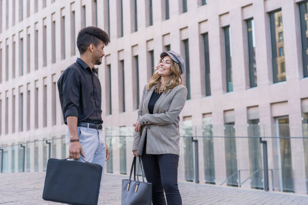 istock Coworkers talking in the city 2070634575