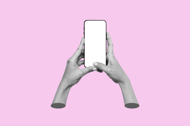 istock Mobile phone with white screen in female hands. Blank with an empty copy space. Mockup of smartphone 2070663349