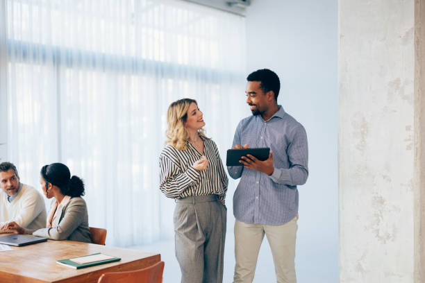 istock Diverse Professionals Engaged in a Casual Business Discussion in Office 2070679737