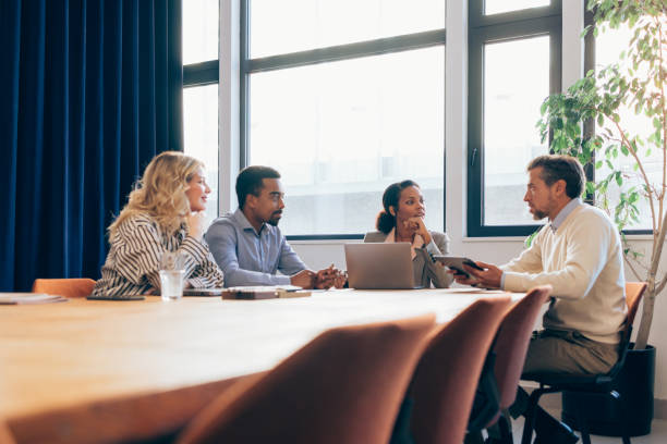 istock Diverse Business Team in a Meeting Room Discussing Strategy 2070679747