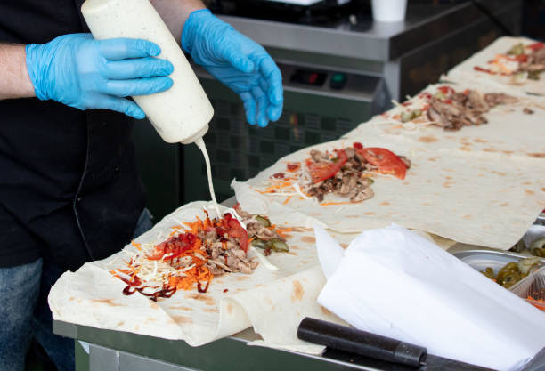 istock Cooking shawarma in the kitchen in a cafe 2070771120