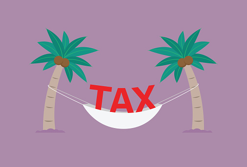 tax with coconut tree on a beach for tax haven concept