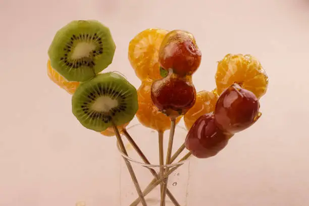Photo of Tanghulu is Skewered Fruits Dipped in Sweet Sugar Syrup.