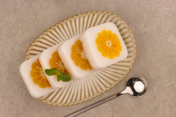 istock White Pudding Jelly Filled with Tangerines. 2070828217
