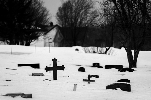 Christian cemetery under the deep snow.