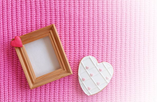 istock White Heart Shaped Cookie Woolen Background. Wooden Empty Frame. Valentine Mothers Day Concept. Love Background. Vintage Retro Gradient Effect Photography 2070838266