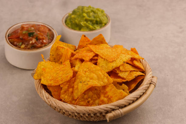 istock Tortilla Chips or Nachos with Two Super Bowl Dips which are Salsa and Guacamole. 2070845559