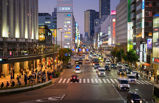 Crowd of people central business distraict Umeda twilight street central business district and residentail building with crowd of people