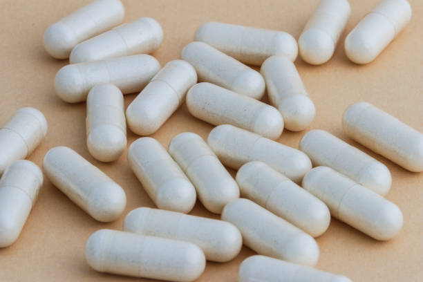istock A stack of supplement capsules, dietary supplements, vitamin tablet, nutritional supplements in capsule form. 2070854227