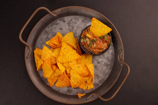 istock Tortilla or Nachos and Salsa Sauce. 2070854750