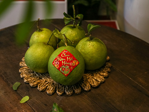 South Vietnam Grapefruit Bentre on dark wood table