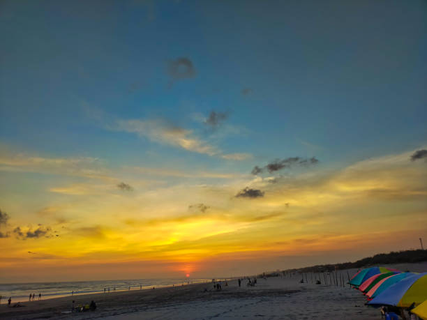 istock The atmosphere on the beach at sunset, dramatic clean clouds 2070895267