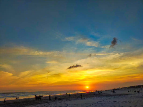 istock The atmosphere on the beach at sunset, dramatic clean clouds 2070897124