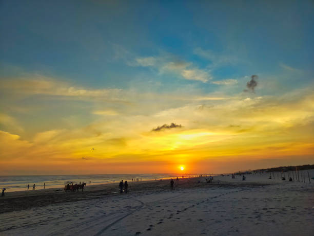 istock The atmosphere on the beach at sunset, dramatic clean clouds 2070897348