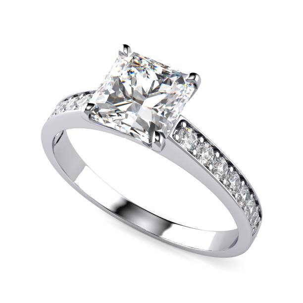 istock Diamond engagement ring with a radiant cut stone, isolated top view on white background 2070926182