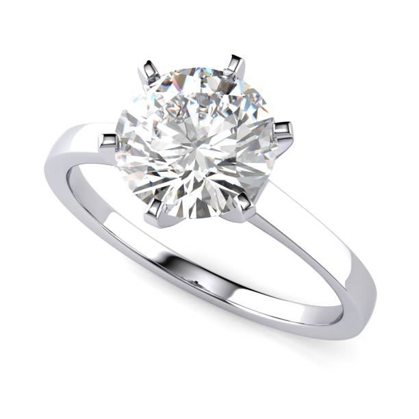istock Solitaire diamond engagement ring with a round brilliant cut stone, isolated top view on white background 2070926183