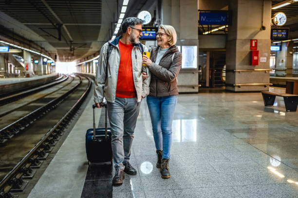 istock Mature couple at railway station 2070926330