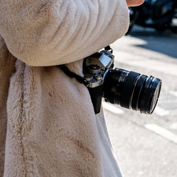 Soho, London UK, March 08 2024, Anonymous Woman Carrying A Fujifilm Digital Camera With Lens