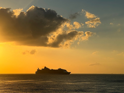 A cruise ship sails by the island of Cozumel, Mexico in March 2024.