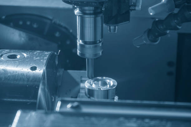 istock The 5-axis CNC milling machine  hole boring the automotive part with solid end mill  tools. 2070979026