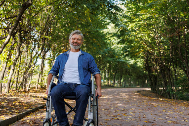 istock Freedom Amidst Nature: Park Visit for Wheelchair User 2070982727