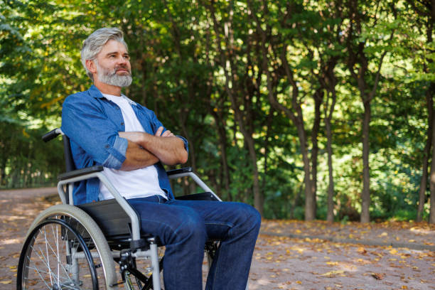 istock Park Serenity: Wheelchair-bound Man Finds Peace 2070984353