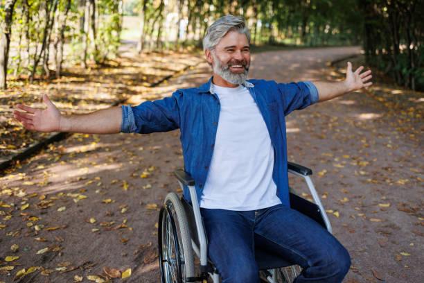istock Freedom in Motion: Wheelchair User Enjoying the Park 2070984906