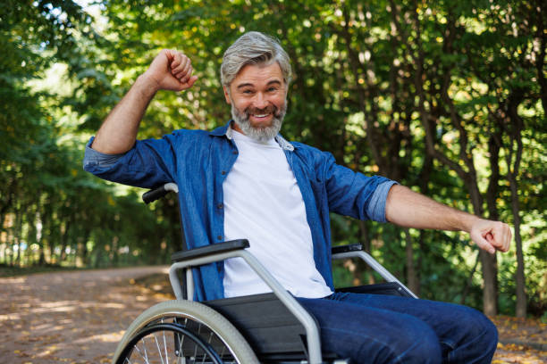 istock Joyful Wheelchair Dancer: A Park Performance 2070984945
