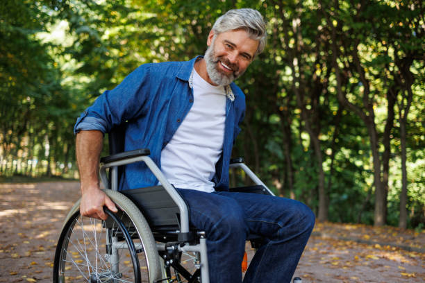 istock Determination: Wheelchair User Rising in the Park 2070984946