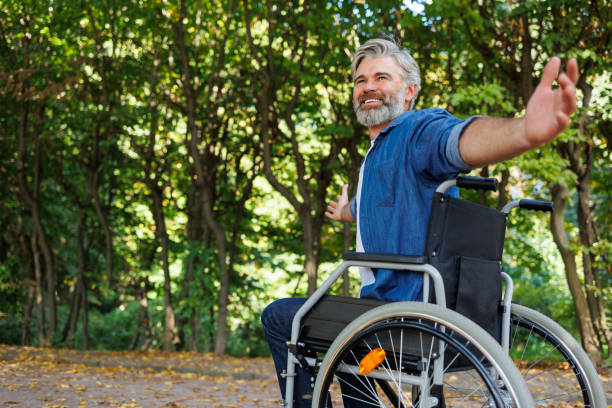 istock Elevating Inclusivity: Wheelchair-bound Man Enjoying Park Freedom 2070986050