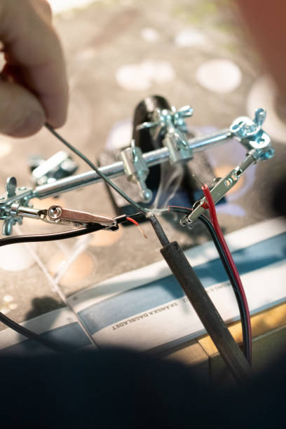istock A man putting wires together 2070988323
