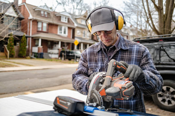 istock Senior male hobby carpenter working outdoors 2071002621