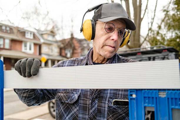 Senior male hobby carpenter working outdoors stock photo