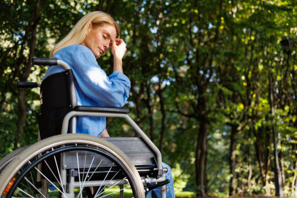 Exploring Nature's Path: Woman in Wheelchair