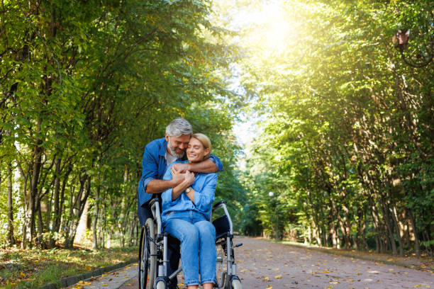 istock Empowering Bond: Wheelchair Users Sharing Moments in Nature 2071009415