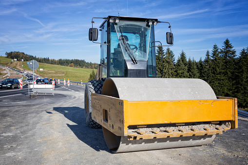 Road construction machinery on the construction of S7 near Nowy Targ, Poland