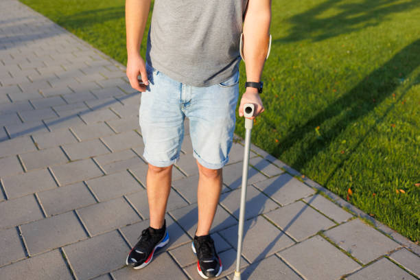 Handsome Male on Crutches Captured in Close-Up