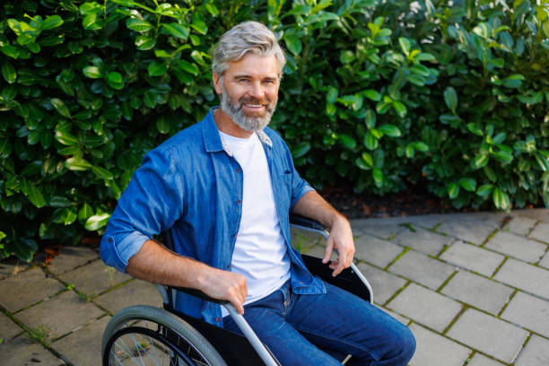 istock Exploring the Outdoors: Handicapped Man in Nature 2071029406