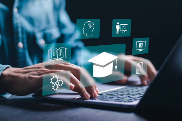 istock Businessman use computer laptop with Online education training icons and e-learning webinar on internet. Increase business working skills. Education internet technology. Online education concept. 2071051706