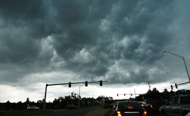 dark storm cloud above the street
