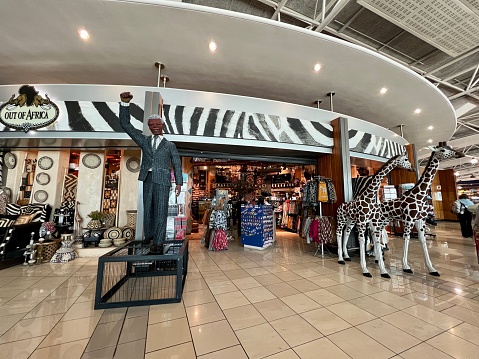 Cape Town, South Africa -  November 27, 2023: Duty Free shops and cafes at Cape Town International airport