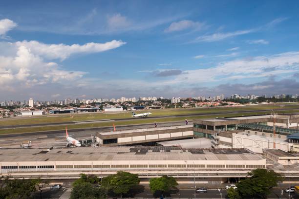 Congonhas Airport, São Paulo, Brazil. Aerial view of the runway, hangares and main building. Congonhas Airport, São Paulo, Brazil. 02.17.24. Aerial view of the runway, hangares and main building. congonhas airport stock pictures, royalty-free photos & images