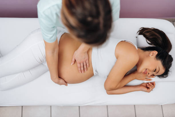 istock Pregnant woman at relaxing massage 2071185000