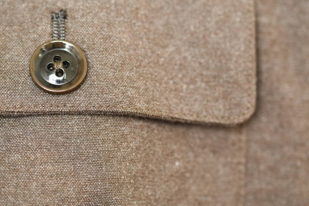 Dark wool coat with one black button