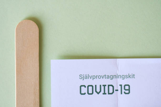 istock Overhead of covid and corona test 2071209048